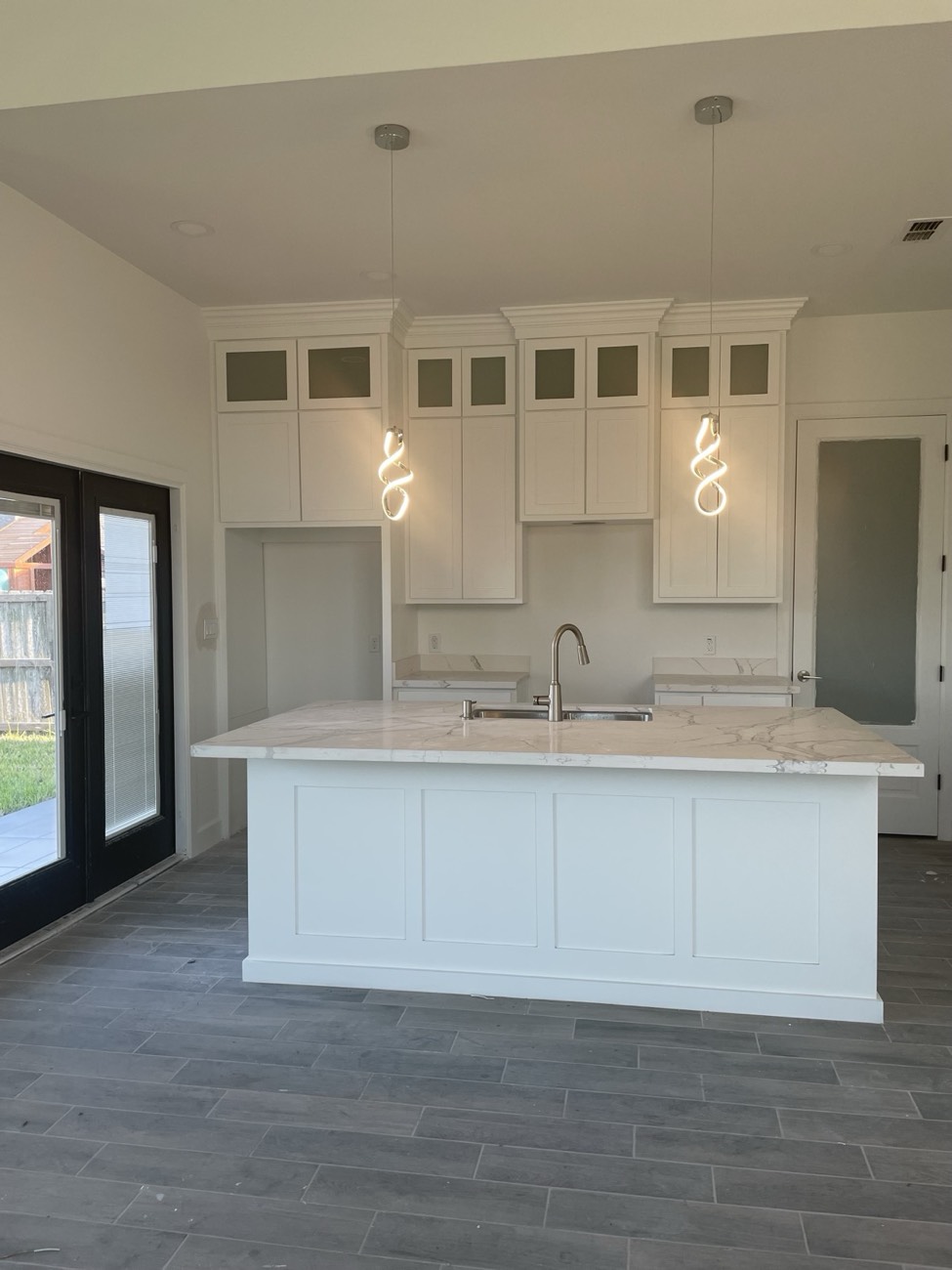 Custom kitchen island with detailed cabinetry